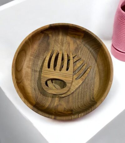 Serving bowl with salad spoons